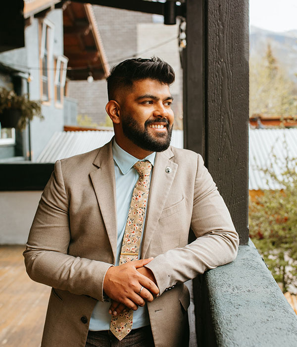 A picture of the GM, Ashish Jolly on the patio of Sauvage.